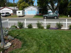 Kresh vinyl picket fence and cottage entry