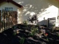 landscaping with custom fence