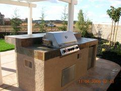 stucco cooking center with slate tile