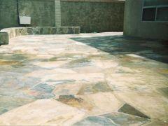 flagstone patio with matching seat wall