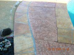 stamped concrete edged with flagstone